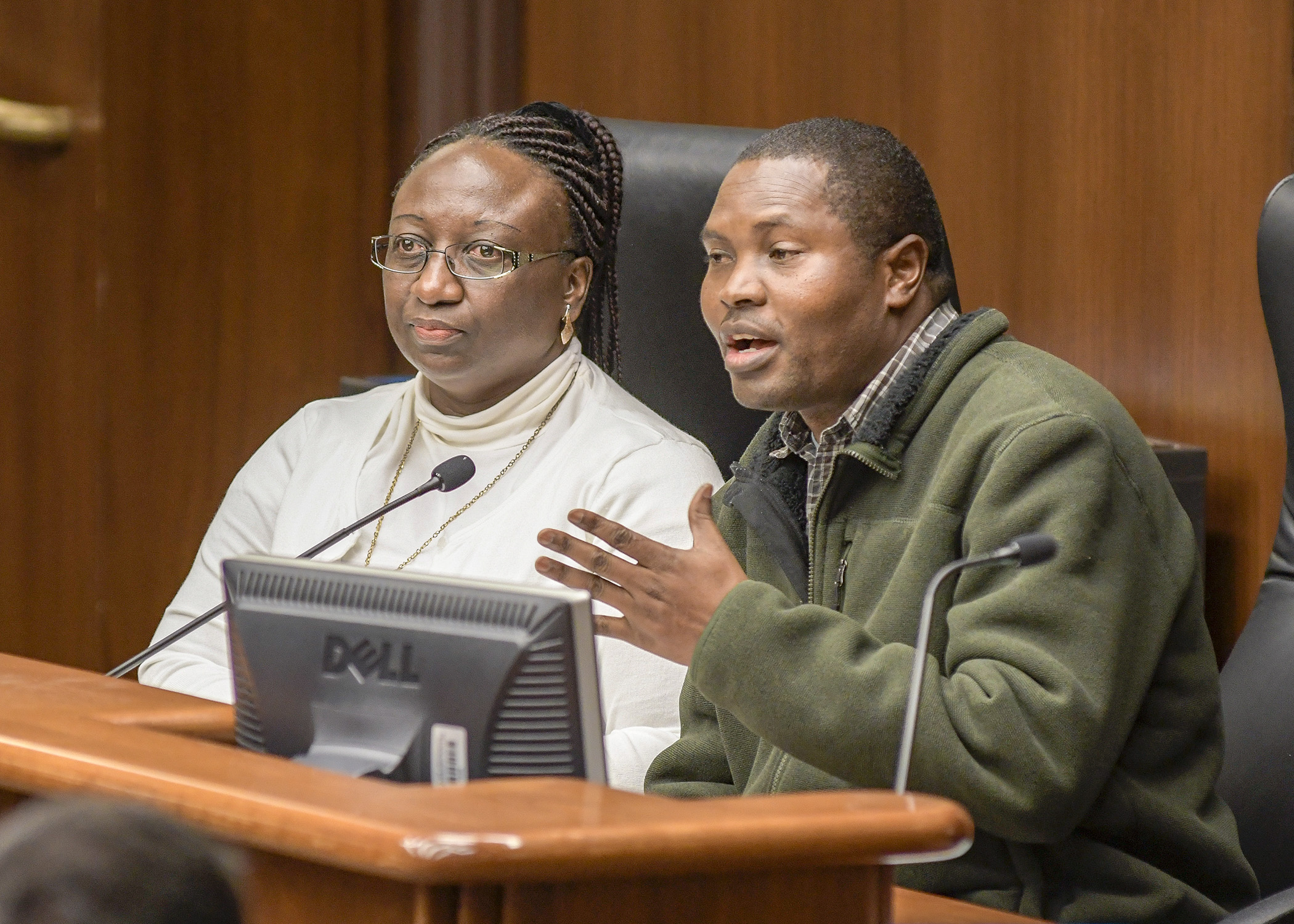Daniel Onyancha and Marie Denise Uwizera testify before the House Jobs and Economic Development Finance Division Feb. 12 in support of a bill that would provide funding for new American workforce training. Photo by Andrew VonBank